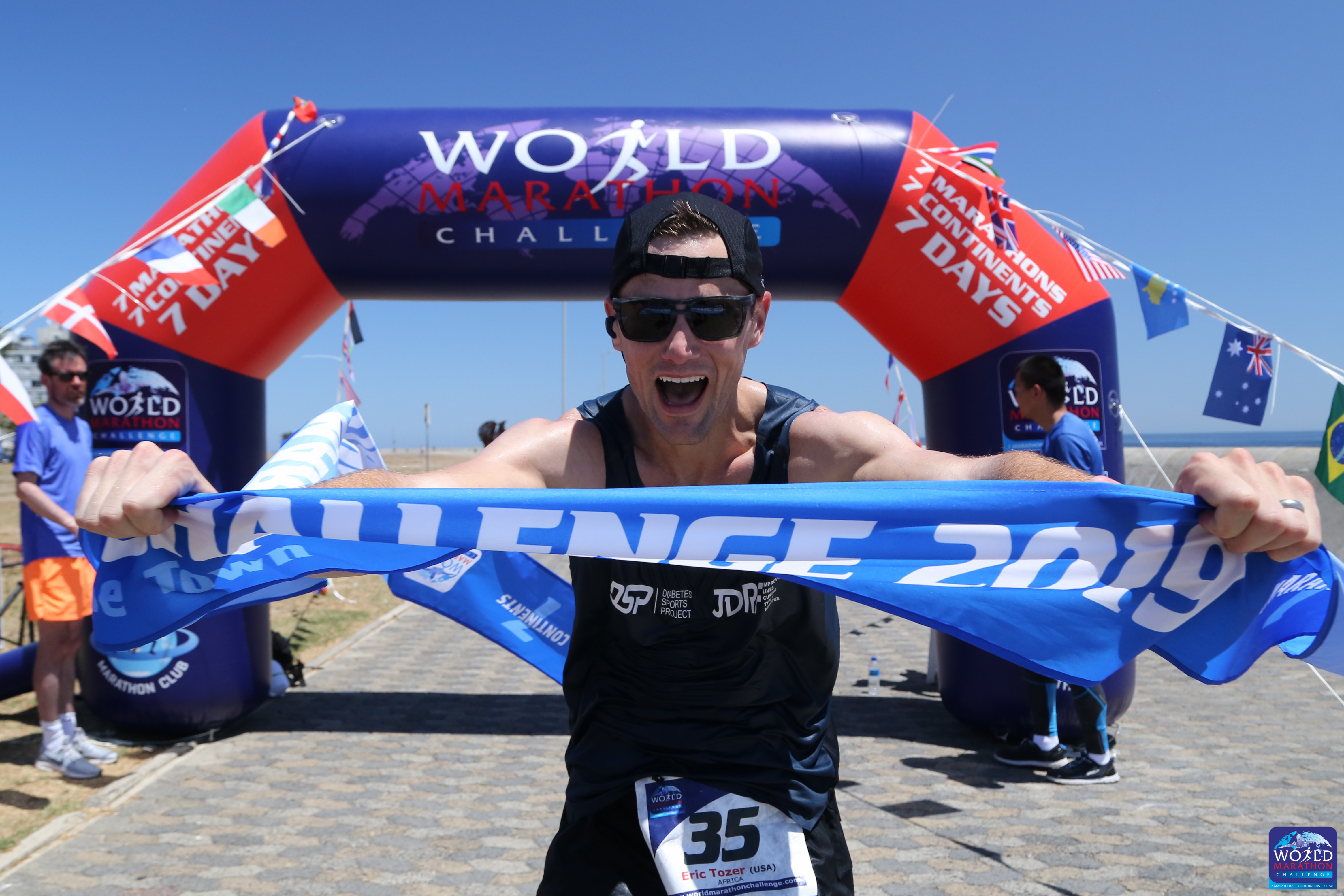 Eric Tozer finishing the Cape Town, Africa leg of the 2019 World Marathon Challenge